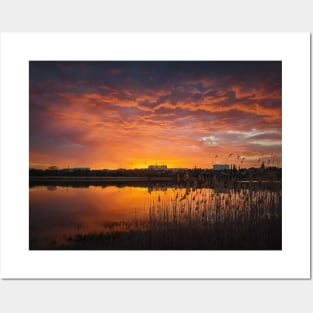 dramatic sunset over lake Posters and Art